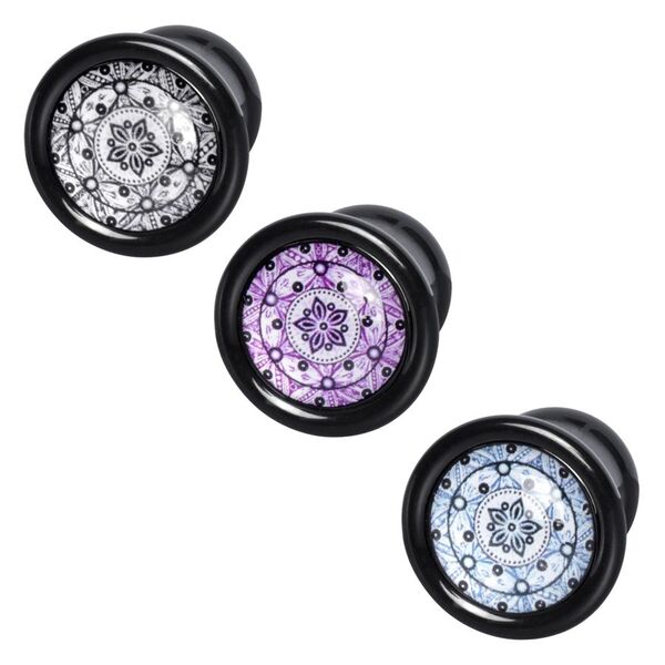 Drei Wildcat Zendala Flower Plugs in Schwarz/Weiß, Violett und Türkis auf weißem Hintergrund