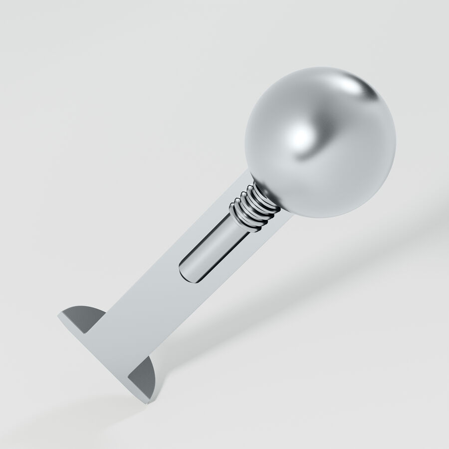 Labret de titan plateado con rosca interna sobre fondo blanco