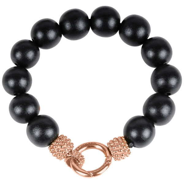 Bracciale in legno nero con accenti in oro rosa su sfondo bianco