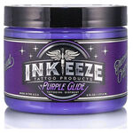 Barattolo di crema per tatuaggi viola con logo Ink Eeze su sfondo bianco