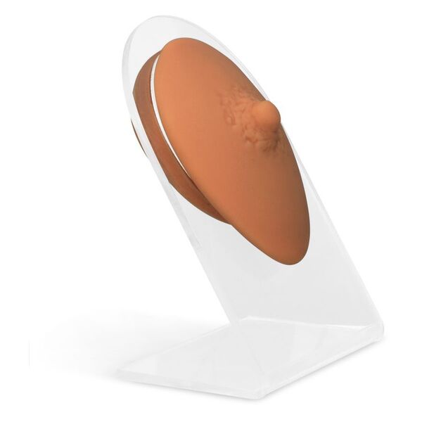 Capezzolo in silicone marrone su display trasparente