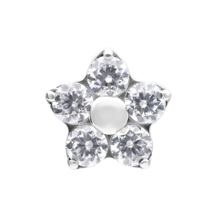 Fiore d'argento in titanio con cinque cristalli chiari su sfondo bianco