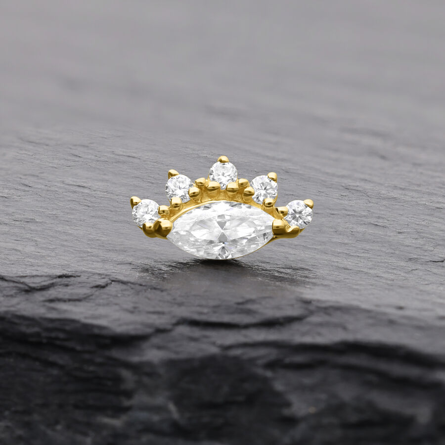 Goldener Moissanite-Aufsatz mit fünf Steinen auf dunklem Hintergrund