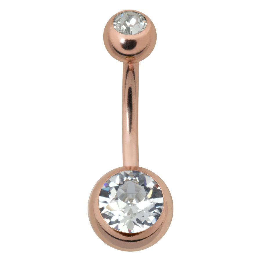 Piercing all'ombelico in oro rosa con due pietre cristalline su sfondo bianco
