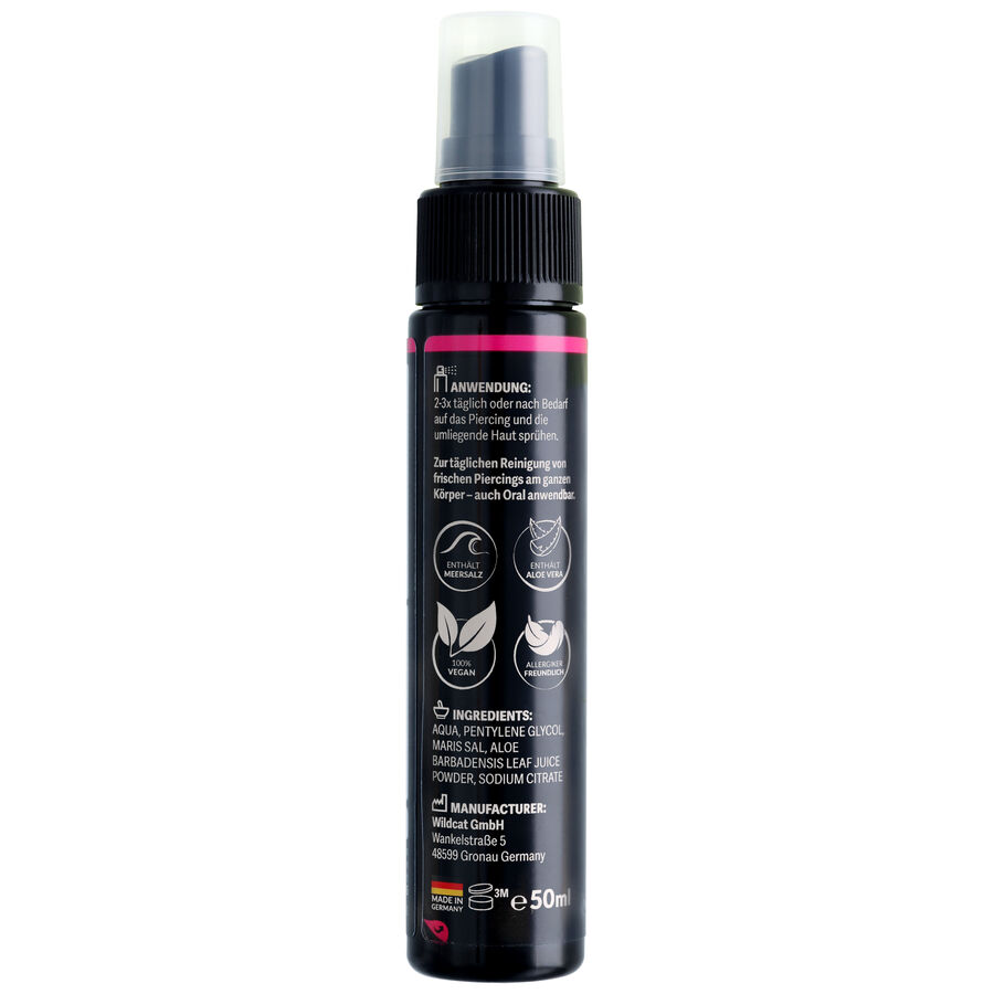 Schwarze 50ml Sprühflasche mit Piercingspray, weißer Text und Icons, auf weißem Hintergrund