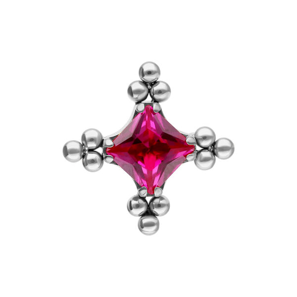 Accesorio plateado con cristal rojo rubí y patrón de burbujas sobre fondo blanco