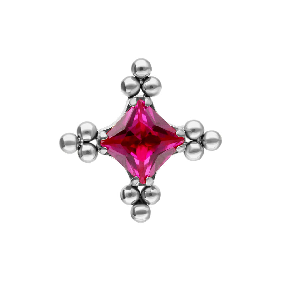 Accesorio plateado con cristal rojo rubí y patrón de burbujas sobre fondo blanco