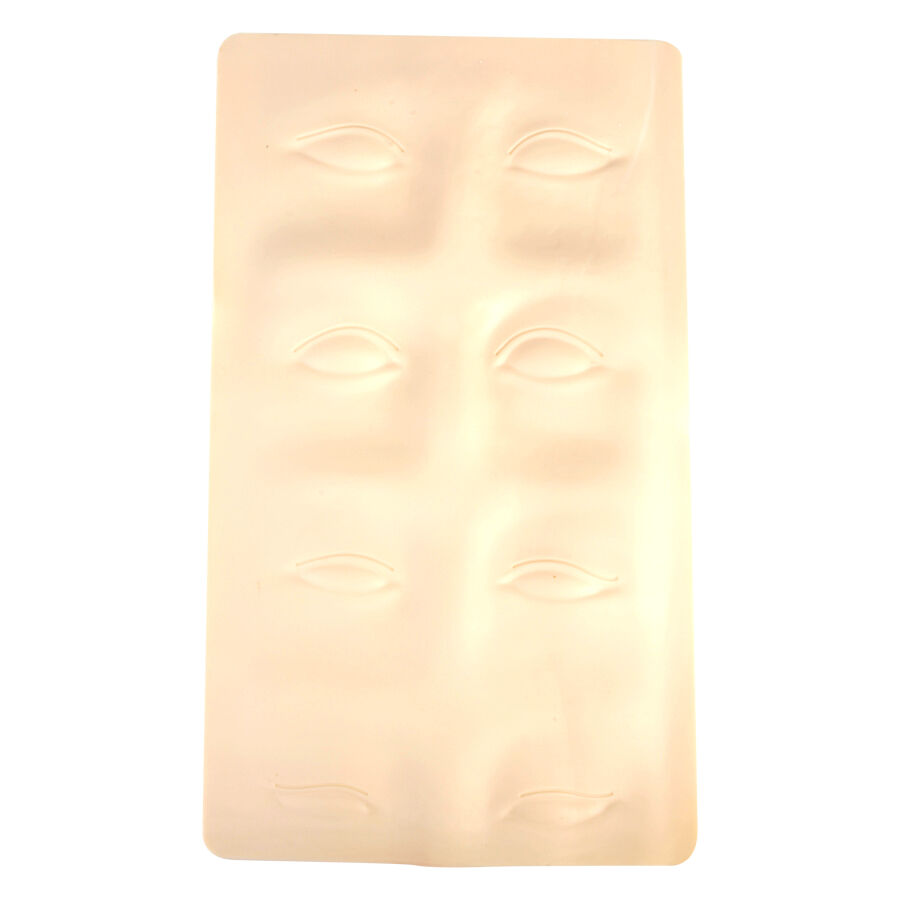 Piastra in silicone beige con contorni di sopracciglia su sfondo bianco