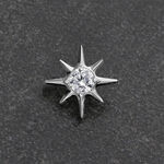Punta a stella di cristallo argento su sfondo grigio