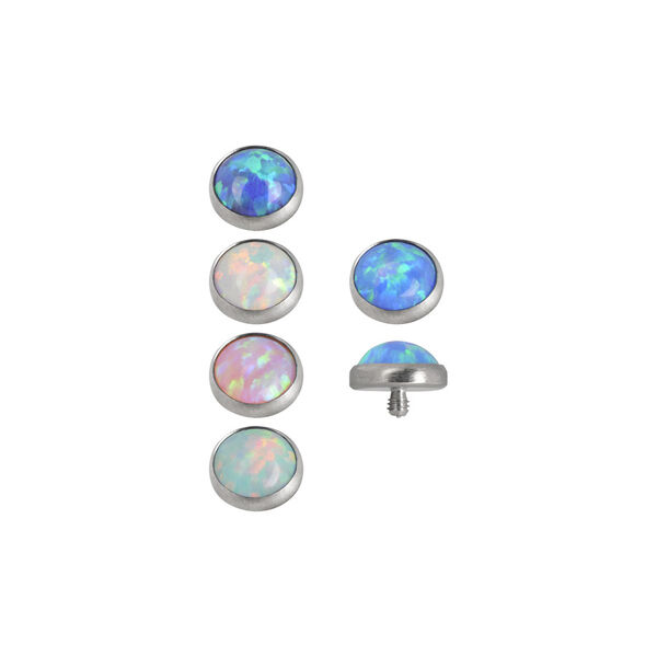 Seis accesorios de anclaje dermal de ópalo en diferentes colores sobre fondo blanco