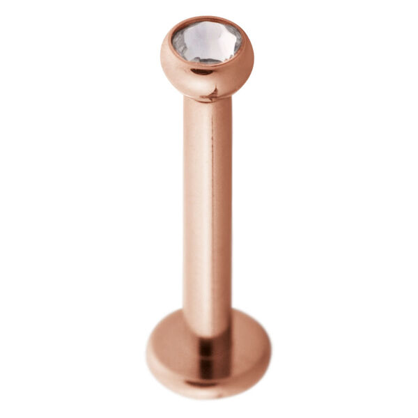 Labret de oro rosa de acero quirúrgico con bola de cristal clara sobre fondo blanco