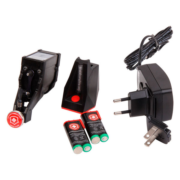 Máquina de tatuaje negra con accesorios sobre fondo blanco