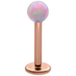 Micro Labret de bola de ópalo sintético rosa con barra de titanio dorado rosa sobre fondo blanco