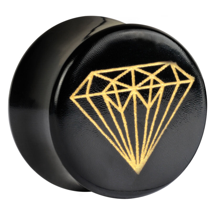 Plug de cuerno negro con diseño de diamante dorado sobre fondo blanco