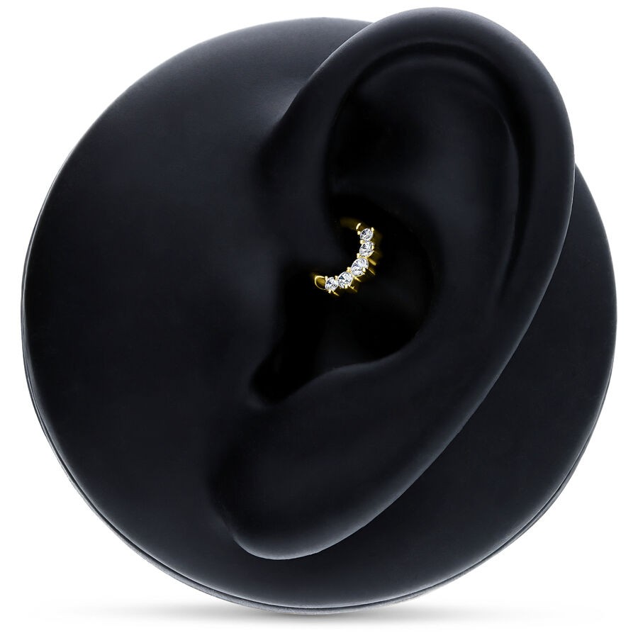 Clicker de septum dorado con cristales claros en modelo de oreja negra