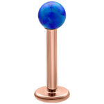 Dunkelblauer Opal Kugel Labret auf roségoldenem Titanstab, Studiohintergrund