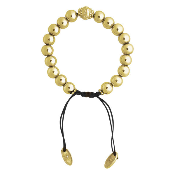 Pulsera dorada con cuentas redondas y banda negra sobre fondo blanco