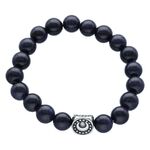 Pulsera unisex Moonshine con perlas azul oscuro y detalle plateado sobre fondo blanco