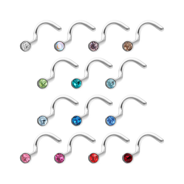 Varios nasenstecker de titan con cristales de colores sobre fondo blanco