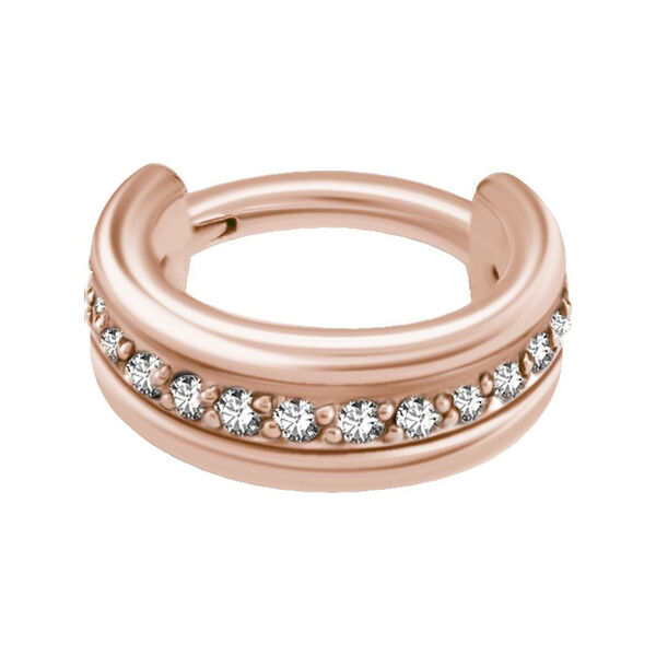 Anello piercing in oro rosa con pietre preziose su sfondo bianco