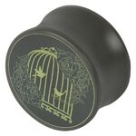 Schwarzer Plug mit floralem Vogelkäfig-Muster auf grauem Hintergrund