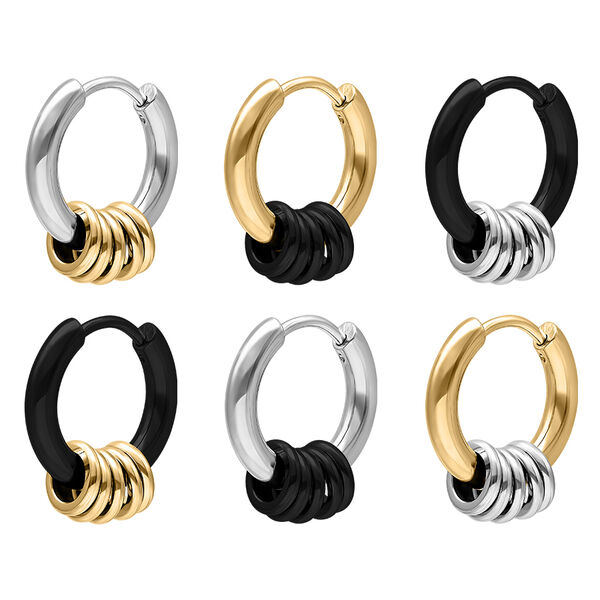 Seis pequeños pendientes en negro, plata y oro sobre fondo blanco