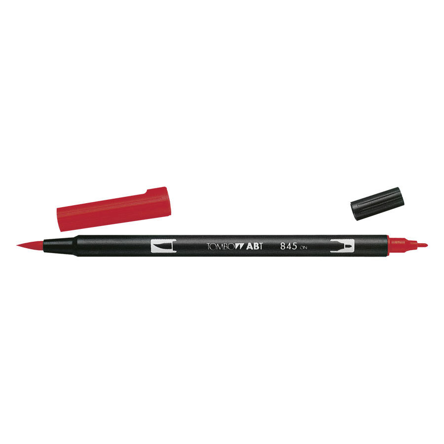 Punainen Tombow Dual Brush Pen kahdella kärjellä valkoisella taustalla