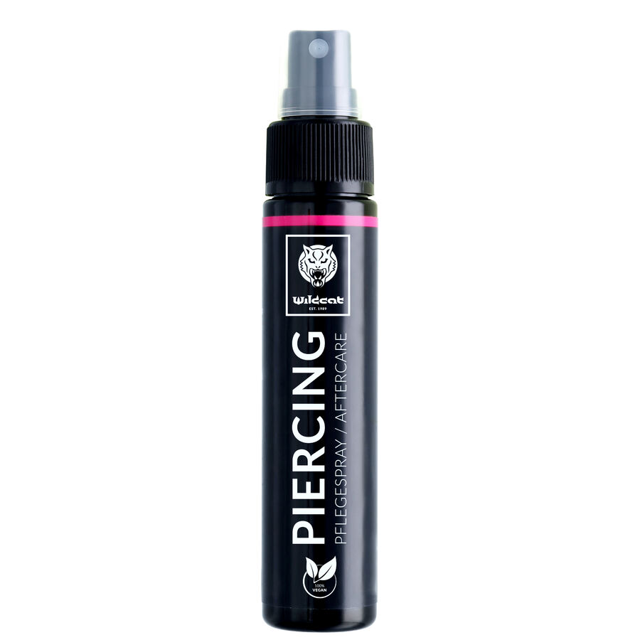 Schwarze Piercingspray-Flasche mit grauem Sprühkopf auf weißem Hintergrund
