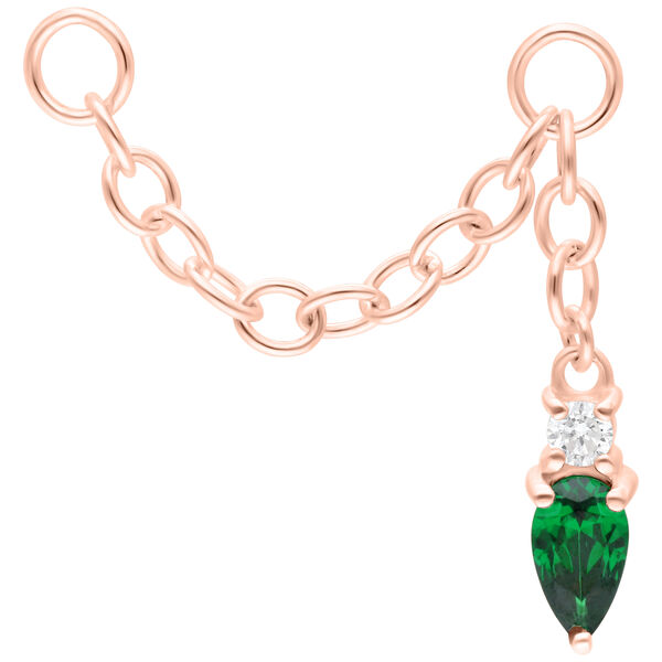Catena in oro rosa con cristallo verde smeraldo e ciondolo su sfondo bianco