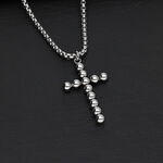 Collana con Croce Bubble in acciaio chirurgico argento su sfondo nero