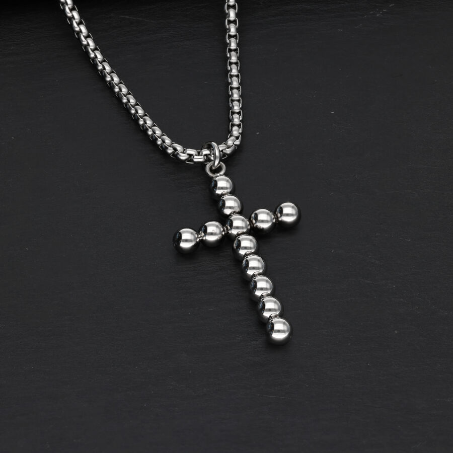 Collana con Croce Bubble in acciaio chirurgico argento su sfondo nero