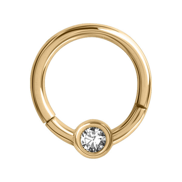 Anello piercing dorato con cristallo chiaro su sfondo bianco