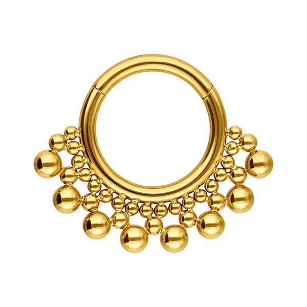 Clicker de septum dorado con adornos de bolas sobre fondo blanco