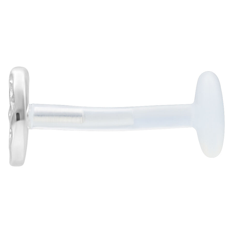 Labret plateado con adorno de círculo martillado y barra transparente sobre fondo blanco