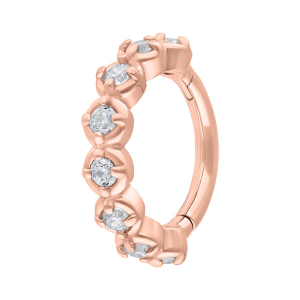 Anillo articulado en oro rosa con cristales claros sobre fondo blanco