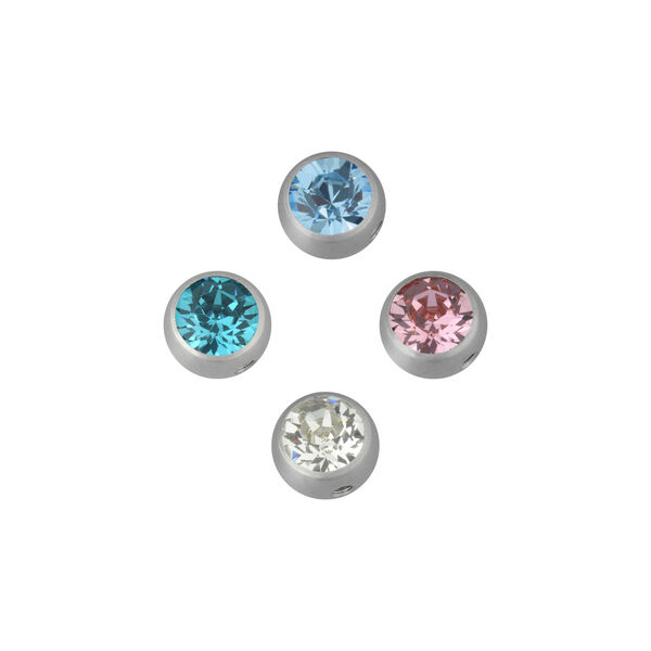 Cuatro accesorios de piercing plateados con cristales en azul, rosa y cristal claro sobre fondo blanco
