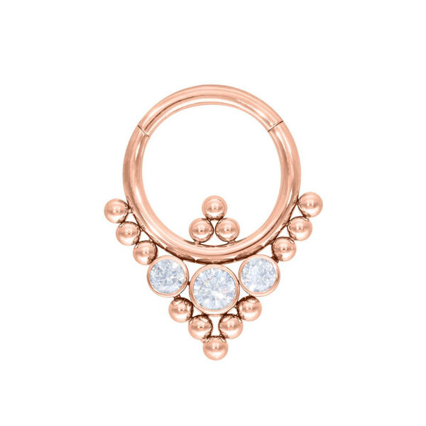 Clicker per setto in oro rosa con cristalli chiari su sfondo bianco