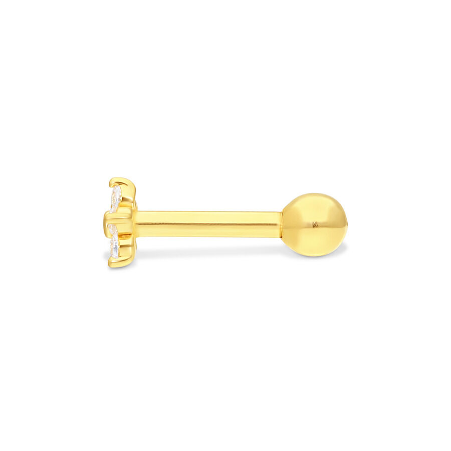 Barbell d'oro per l'orecchio con tre cristalli chiari su sfondo bianco
