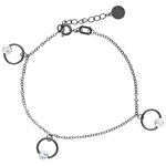Pulsera negra de acero quirúrgico con longitud ajustable y anillos de cristal sobre fondo blanco