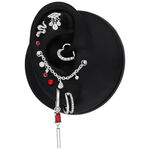 Cadena de piercing plateada con gotas de cristal claras en modelo negro
