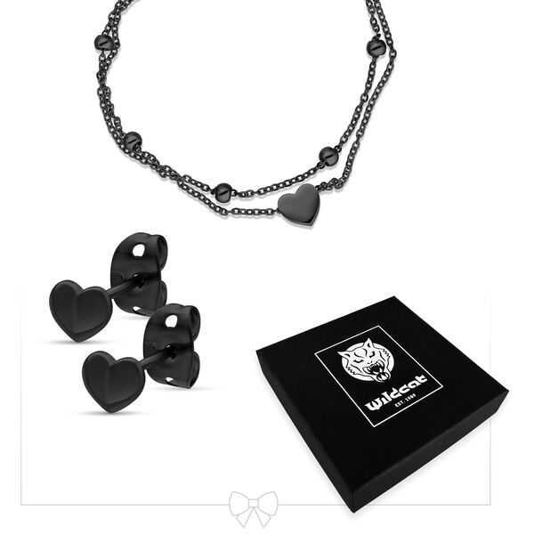 Set di gioielli nero con motivo a cuore in acciaio chirurgico, composto da collana e orecchini, su sfondo bianco