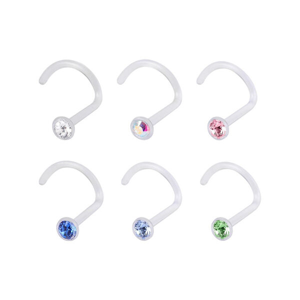Seis piercings de nariz de Bioplast con cristales claros, azules y verdes sobre fondo blanco