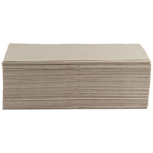 Asciugamano monostrato beige piegato su sfondo bianco