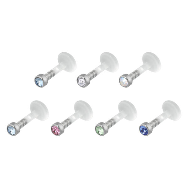 Seis Labrets Push-Fit con cristales de varios colores sobre fondo blanco