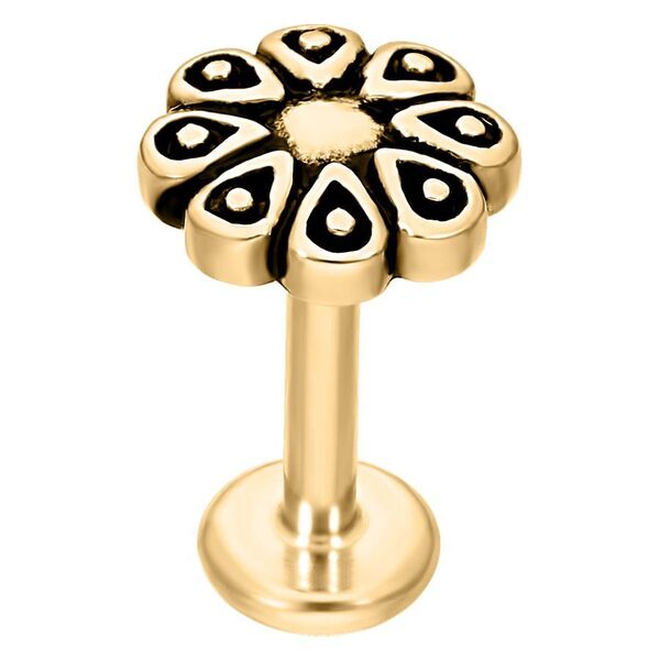 Labret piercing dorado con diseño de flor sobre fondo blanco