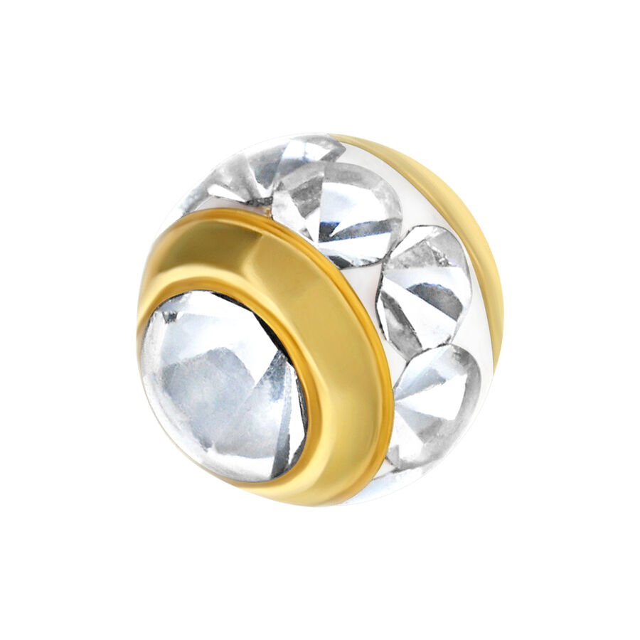 Punta per piercing dorata con cristalli chiari su sfondo bianco