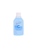 Bottiglia azzurra di Desmanol Care disinfettante per le mani con tappo bianco su sfondo bianco